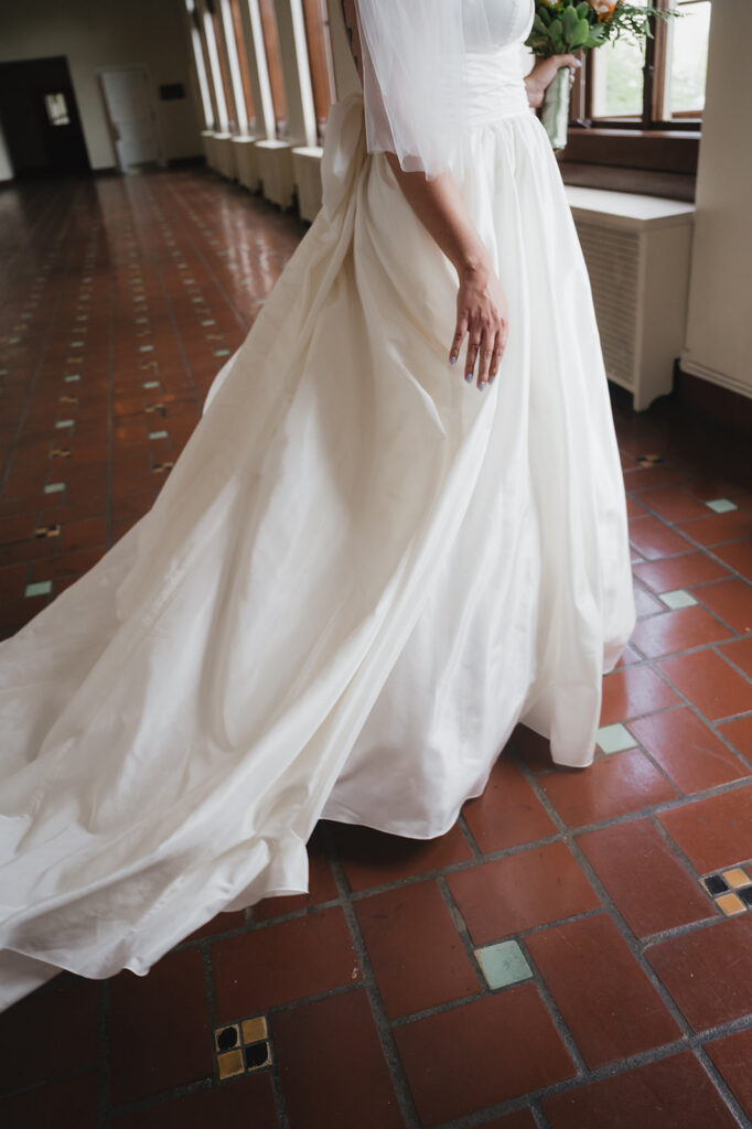 Close up shot of a bride in her wedding dress.