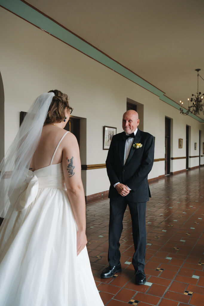 Father seeing his daughter in her wedding gown.