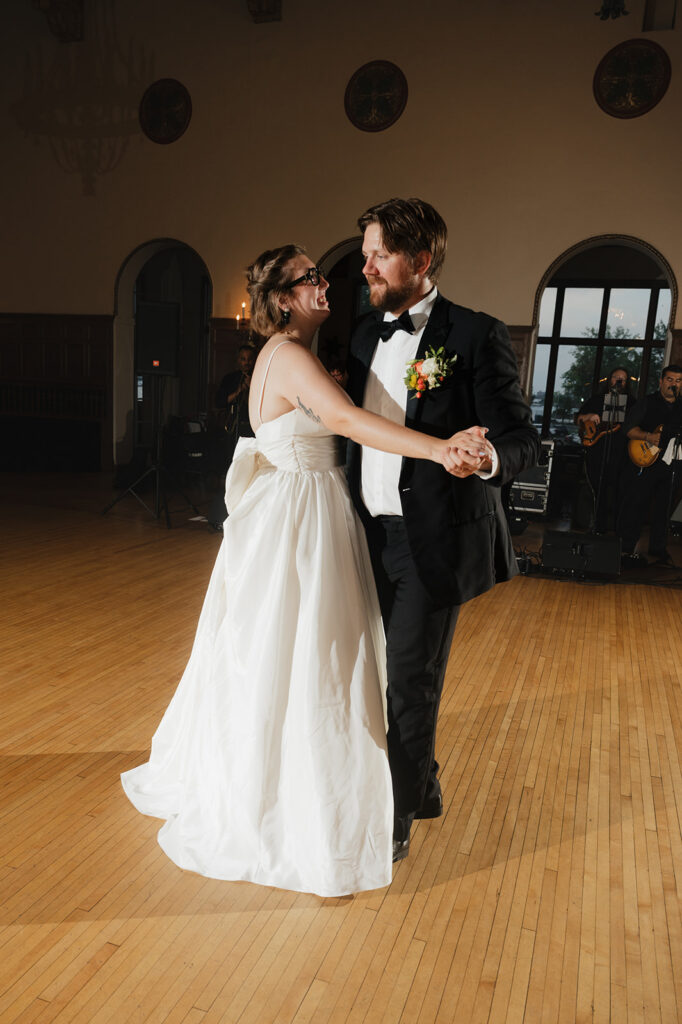 Bride and groom sharing their first dance during their Detroit Yacht Club wedding reception.