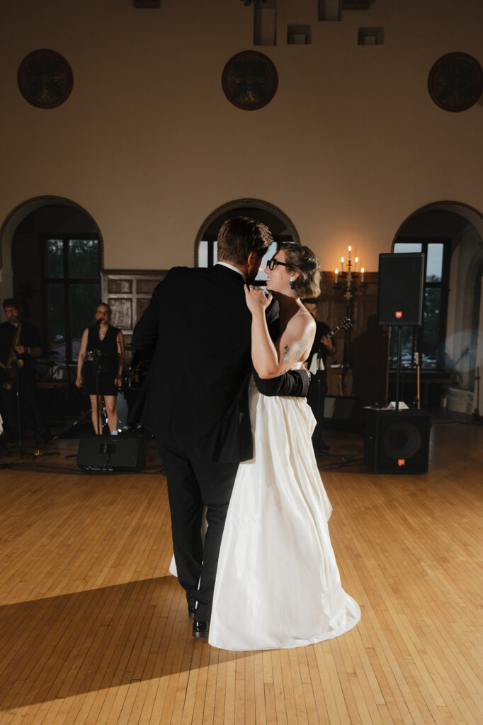 Bride and groom sharing their first dance during their Detroit Yacht Club wedding reception.