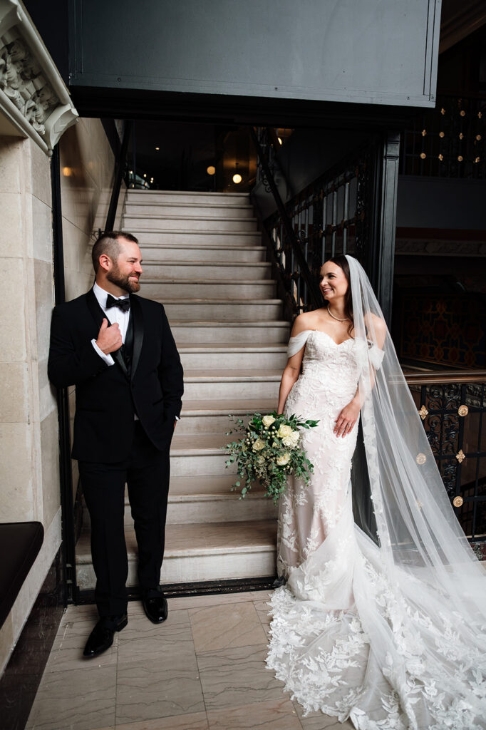 Bride and groom posing at Element Hotel in Detroit, Michigan. 