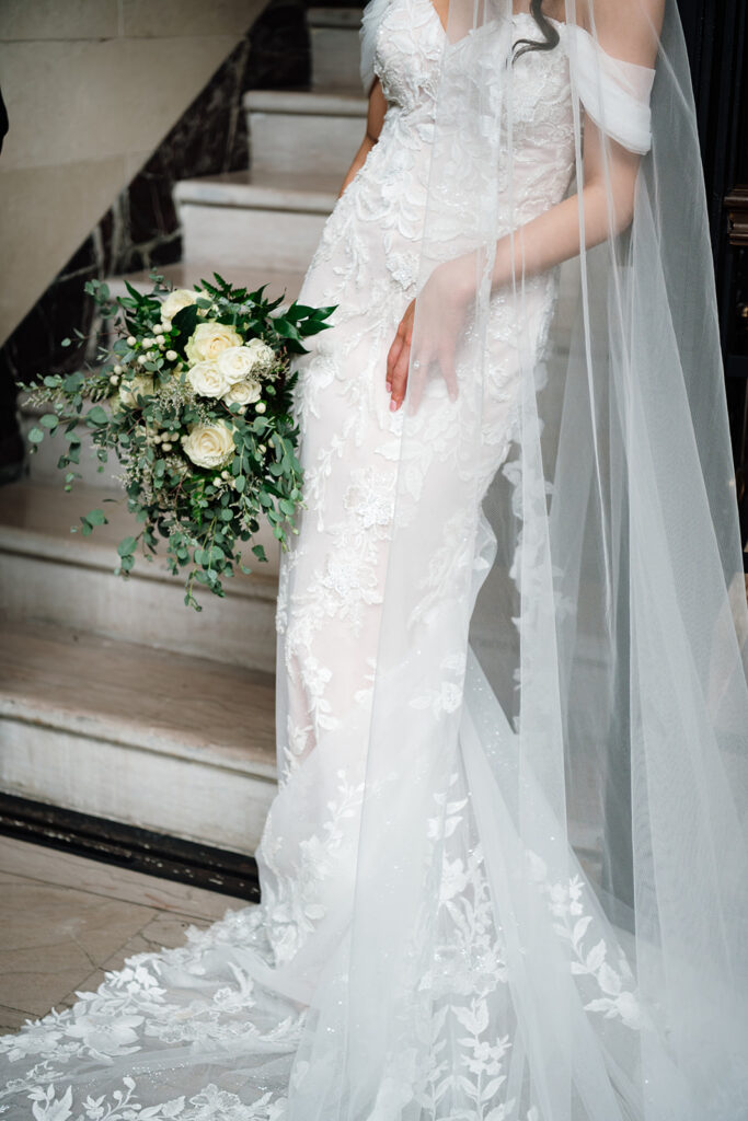 Close up portrait of a bride posing near a staircase. 