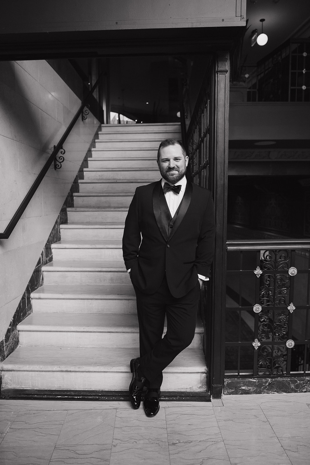 Black and white indoor portrait of a groom at Element by Westin Detroit.