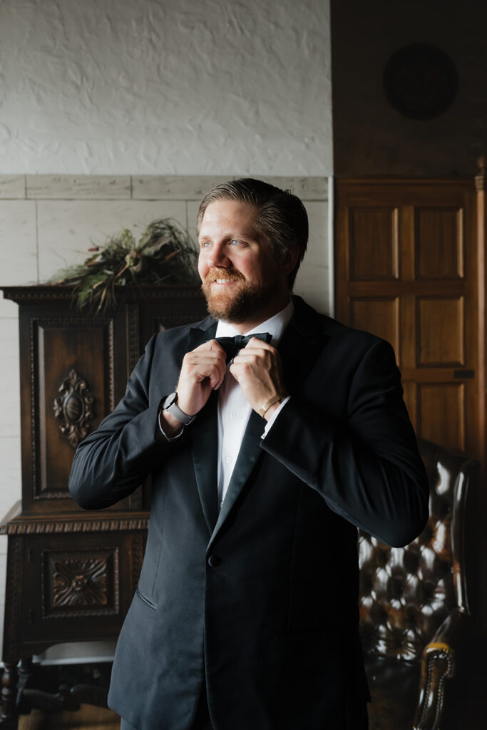 Indoor grooms portraits at Detroit Yacht Club.