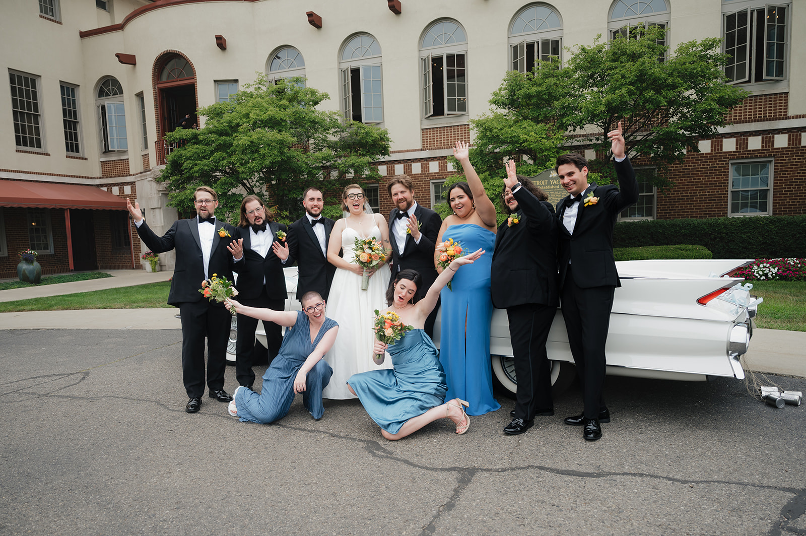 Outdoor wedding party photo outside of Detroit Yacht Club.