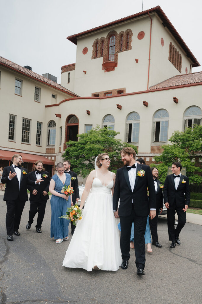 Outdoor wedding party photo outside of Detroit Yacht Club.