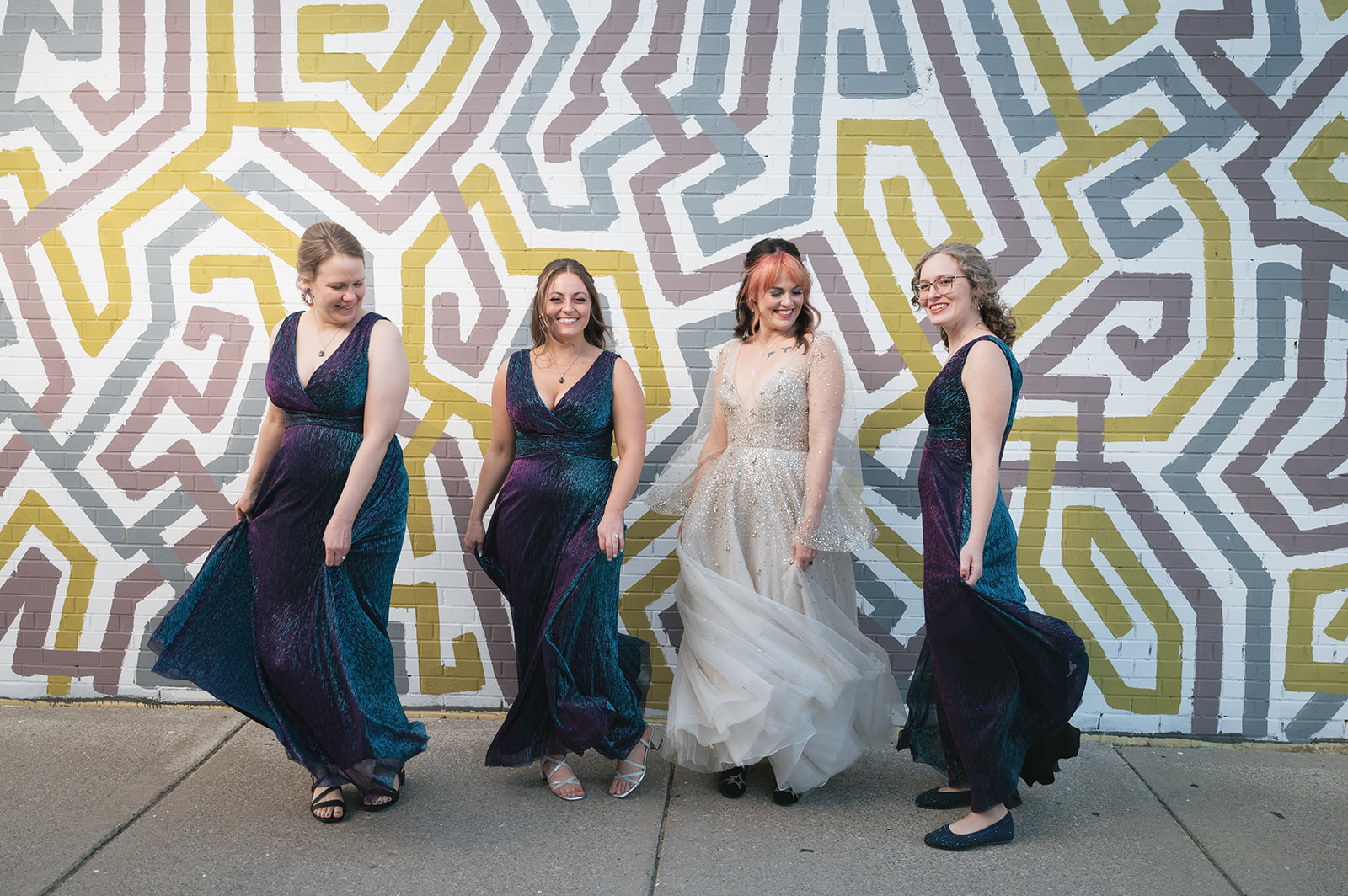 Outdoor bride and bridesmaids portraits from a Ferndale, Michigan wedding.