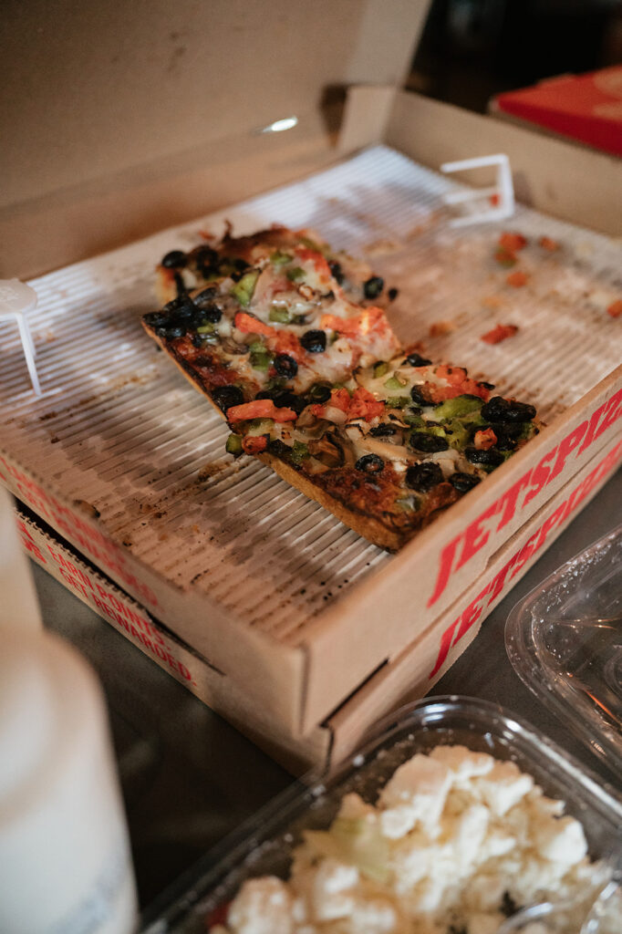Jet’s pizza served at a casual Dog and Pony Show Brewing rehearsal dinner.