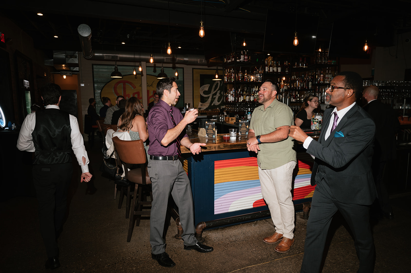 Guests mingling together during a Detroit Fleat wedding reception.