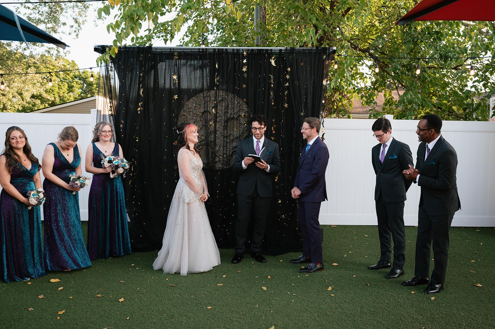 Bride and groom at the altar during their Detroit Fleat wedding ceremony.