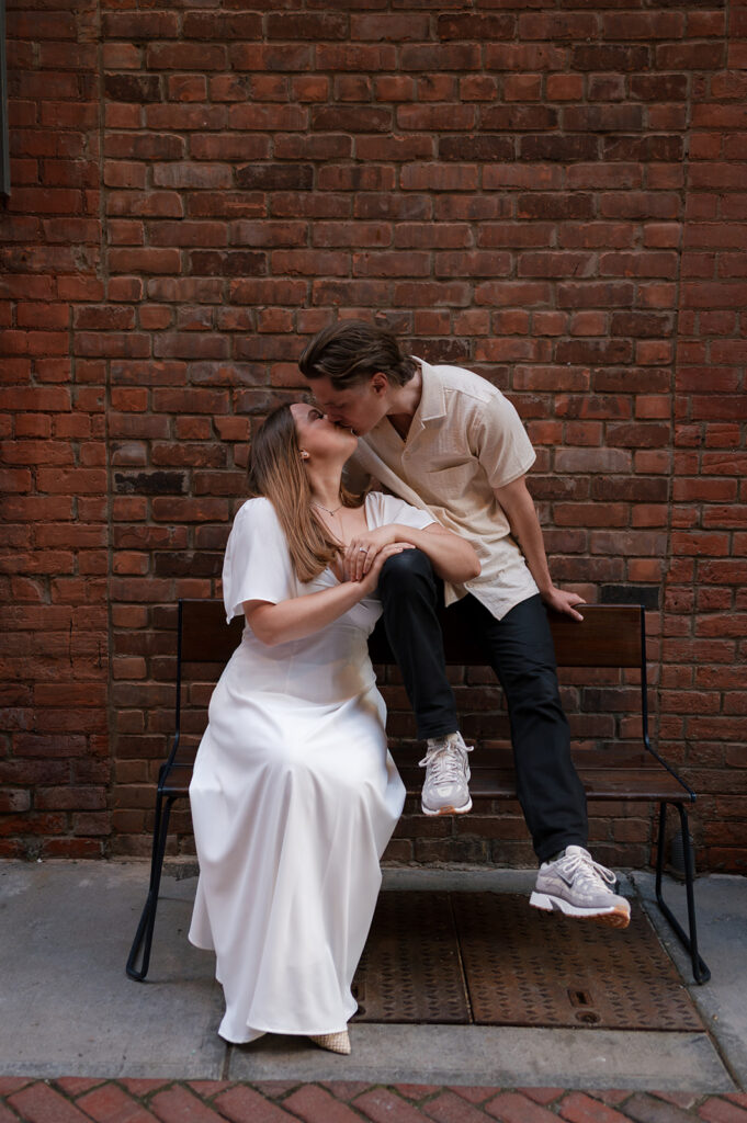 Couple kissing in The Belt in downtown Detroit.