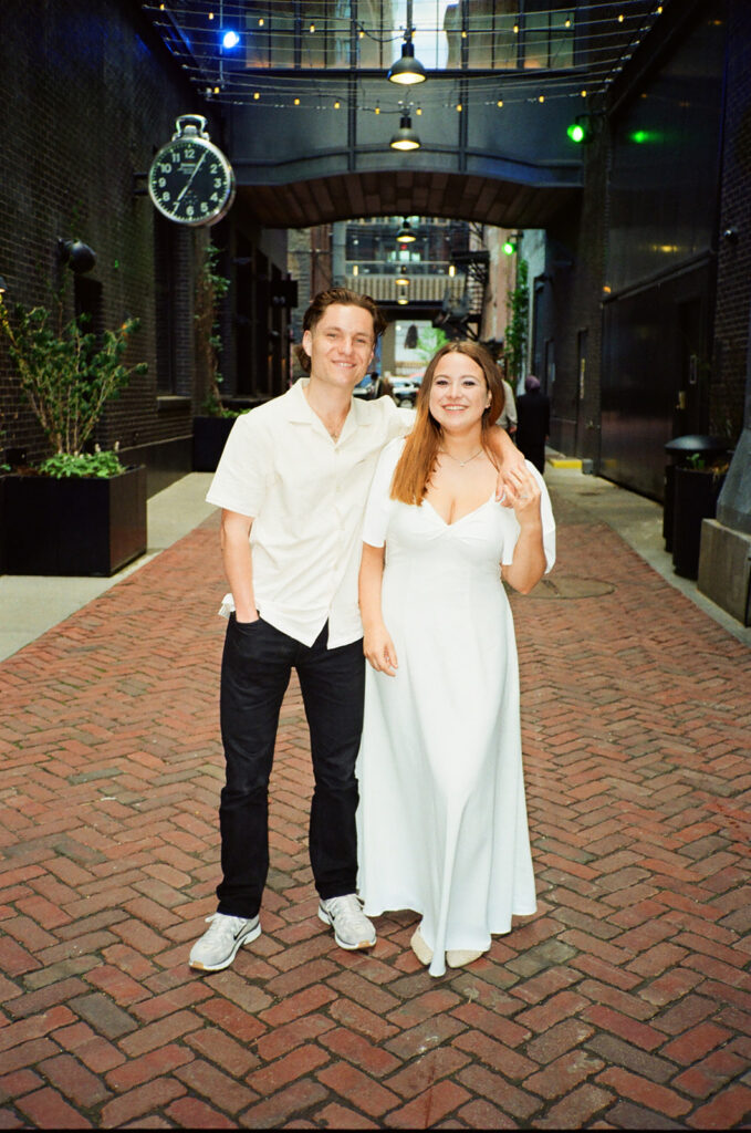 35mm film photo of a couple posing in The Belt alleyway in downtown Detroit.