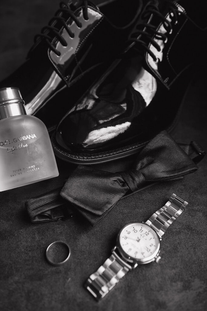 Black and white grooms wedding details.