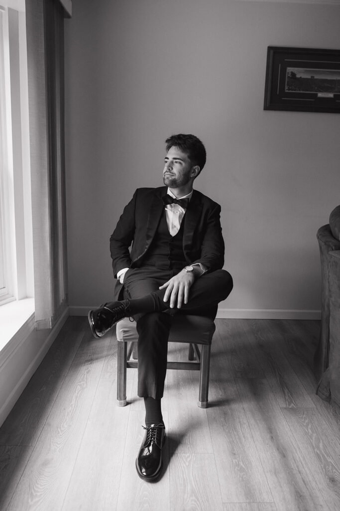 Black and white indoor grooms portraits.