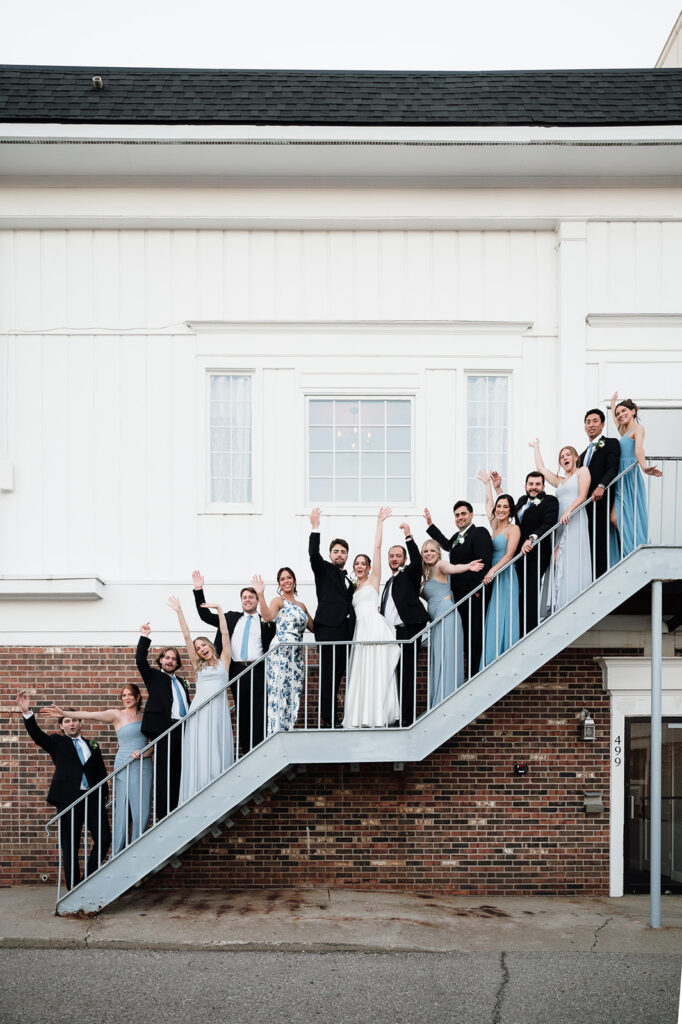 Outdoor Metro Detroit wedding party photos outside of The Meeting House Grand Ballroom in Plymouth.