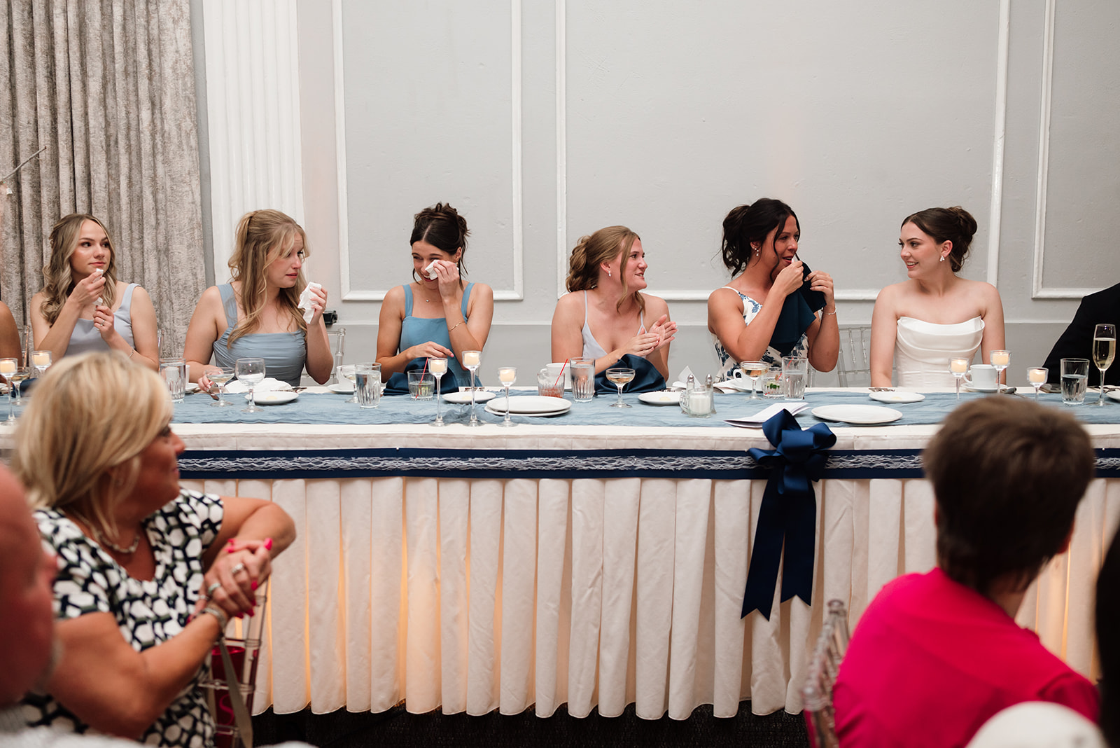 Bridesmaids getting emotional during speeches at Meeting House Grand Ballroom in Plymouth.