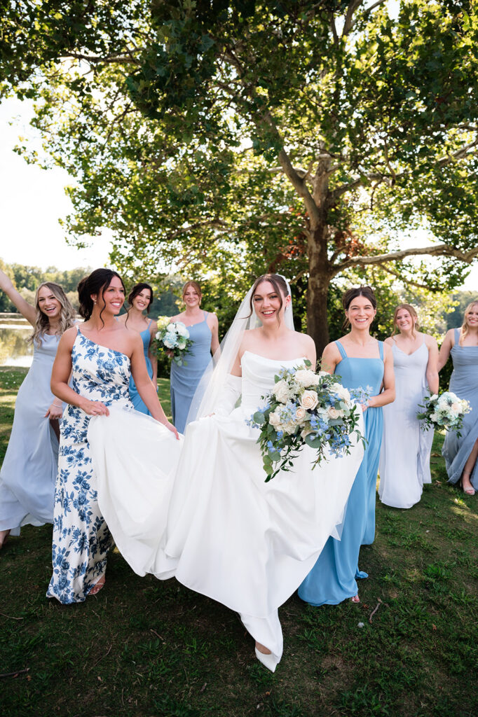 Outdoor bride and bridesmaids photos at Kellogg Park in Plymouth, MI.