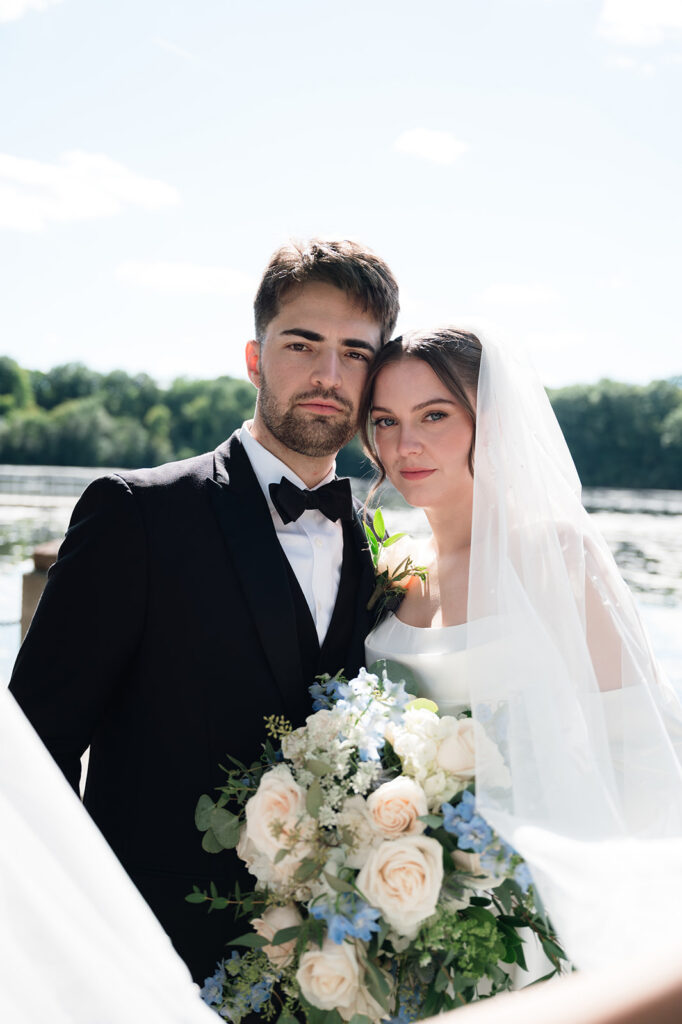 Outdoor bride and groom portraits at Kellogg Park in Plymouth, Michigan.