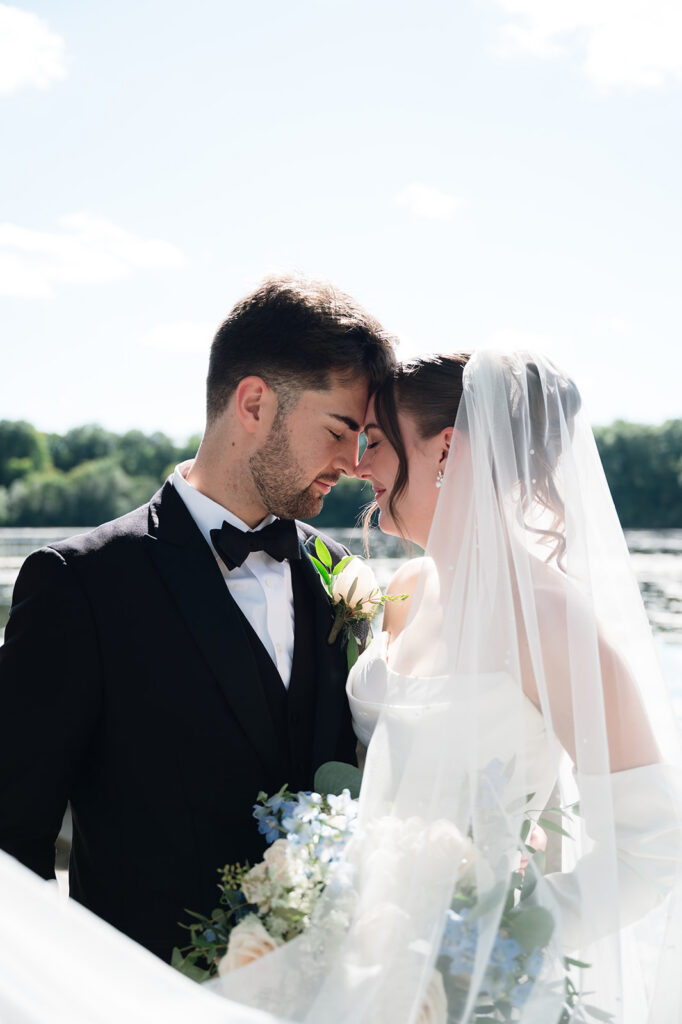 Outdoor bride and groom portraits at Kellogg Park in Plymouth, Michigan.