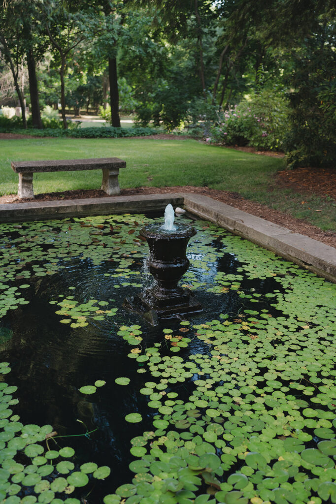 A water fountain and lily pond at Aquinas College.