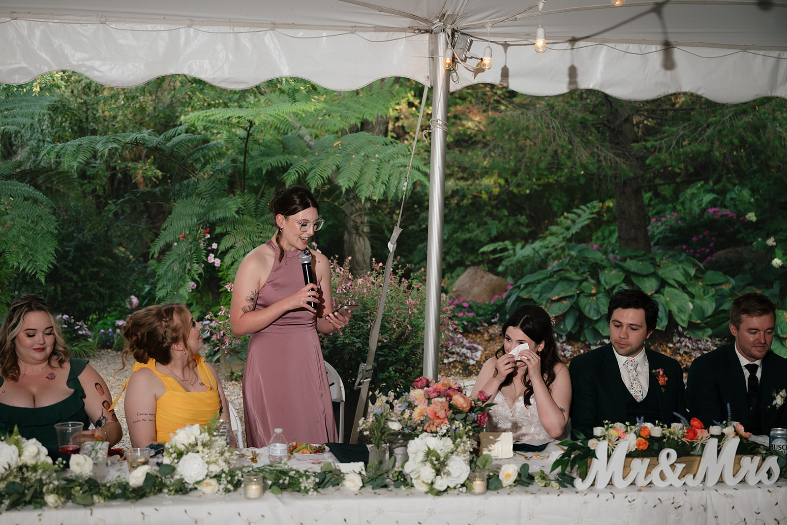 Bride getting emotional during reception speeches.