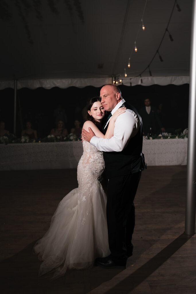 Father daughter dance during a Everlastings in the Wildwood wedding reception.