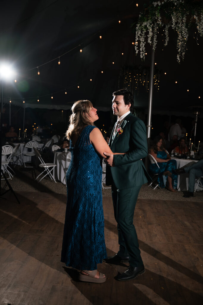 Mother and son dance during a Everlastings in the Wildwood wedding reception.