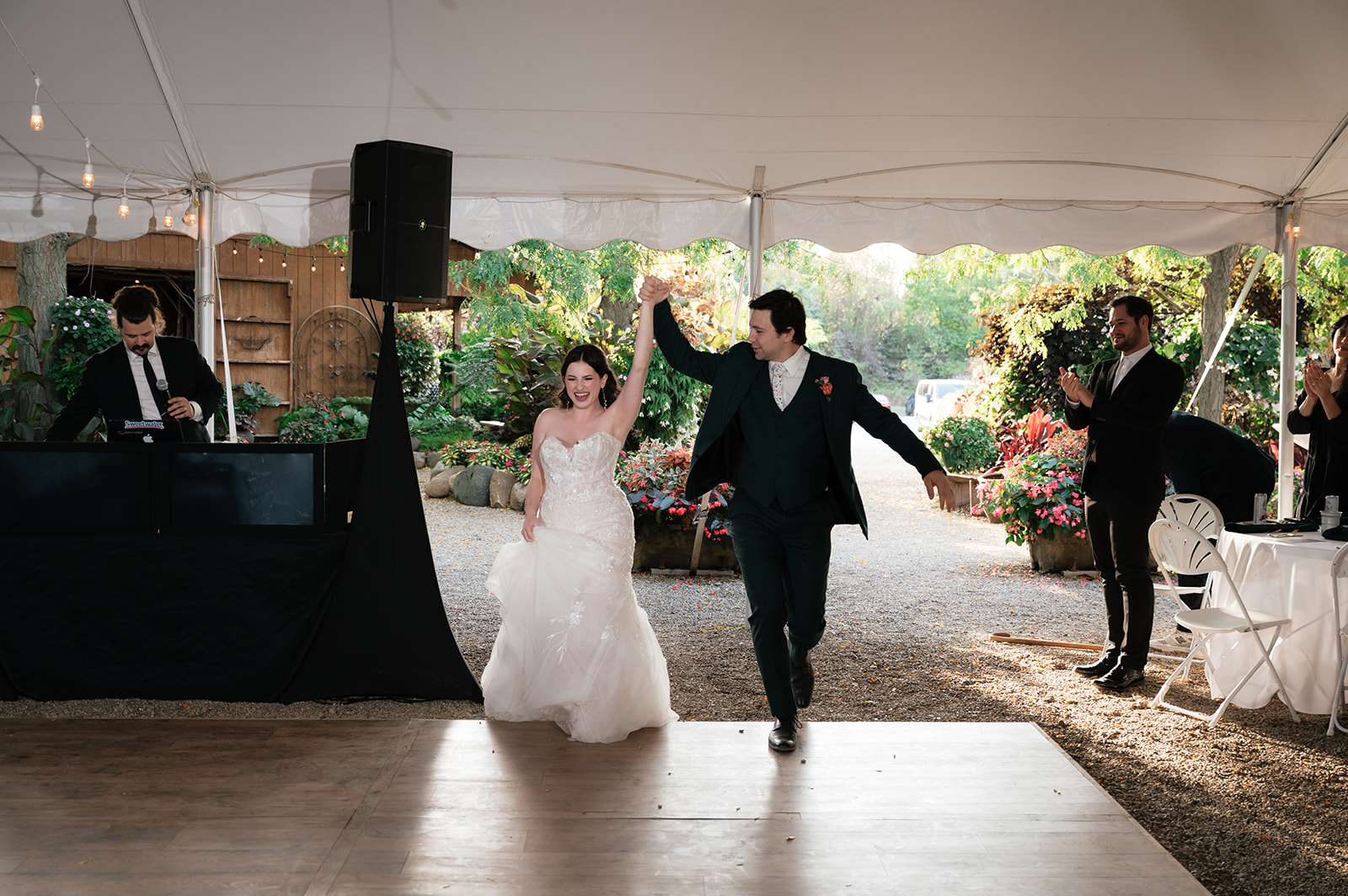 Bride and groom making their grand entrance into their Everlastings in the Wildwood wedding reception. 