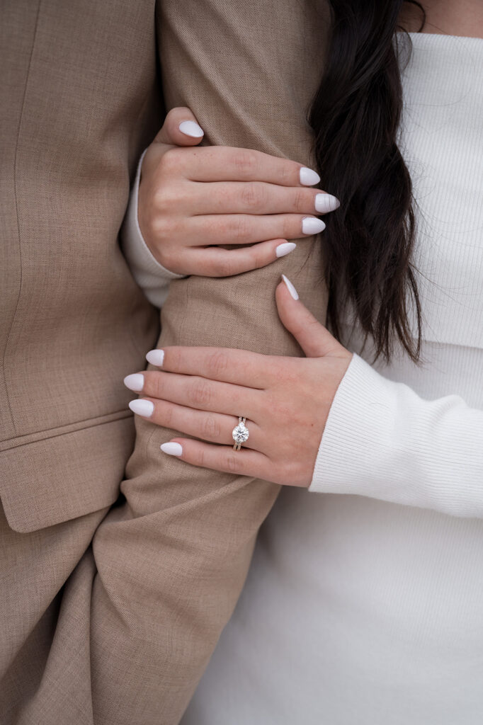 Close up detail shot showing off an engagement ring.