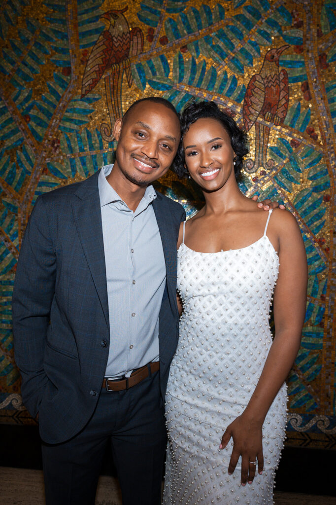 Couple posing inside Fisher Building for their Detroit engagement photos.